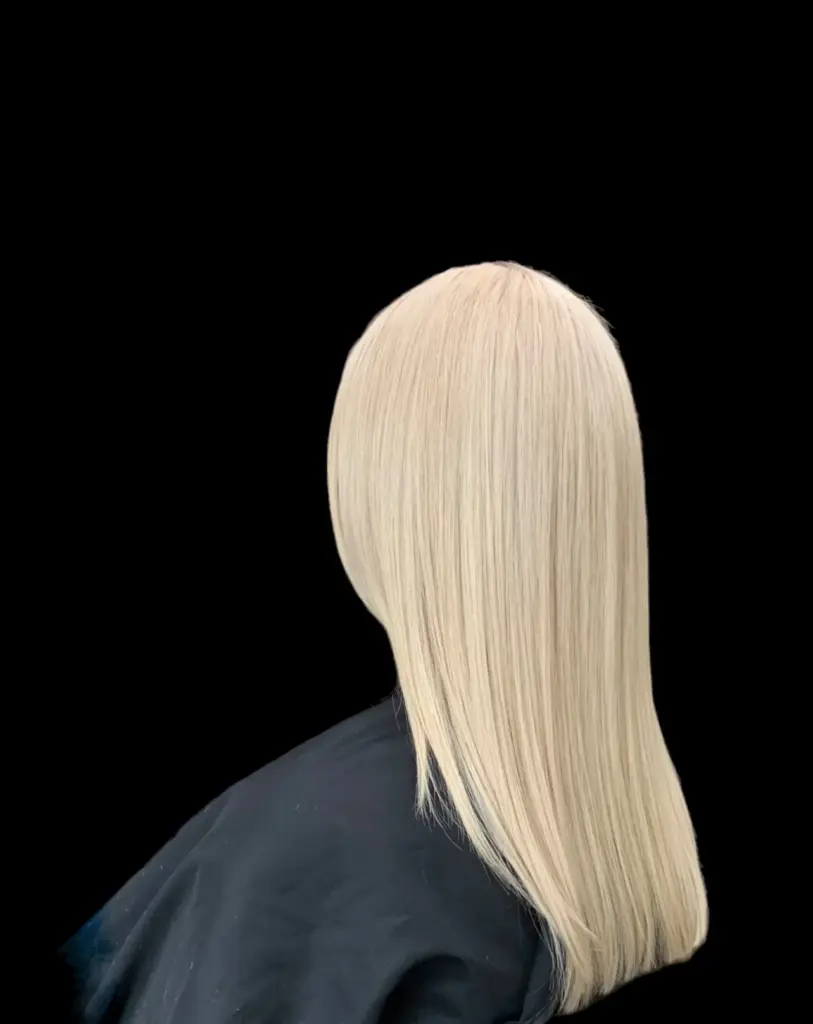 Platinum blonde finish by a Hairmess Salon colorist