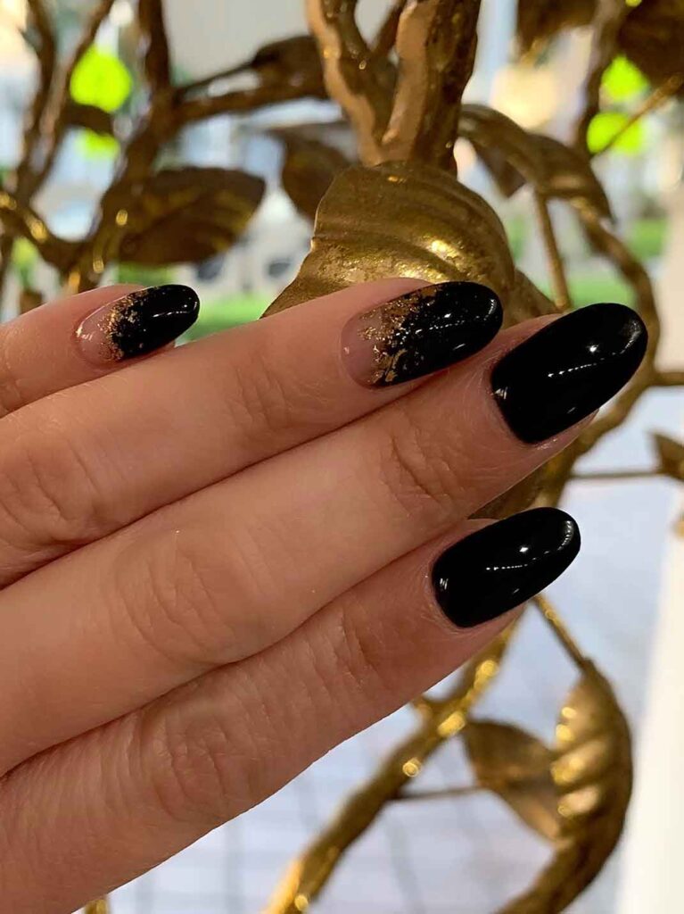 Glossy black gel manicure at Hairmess Salon