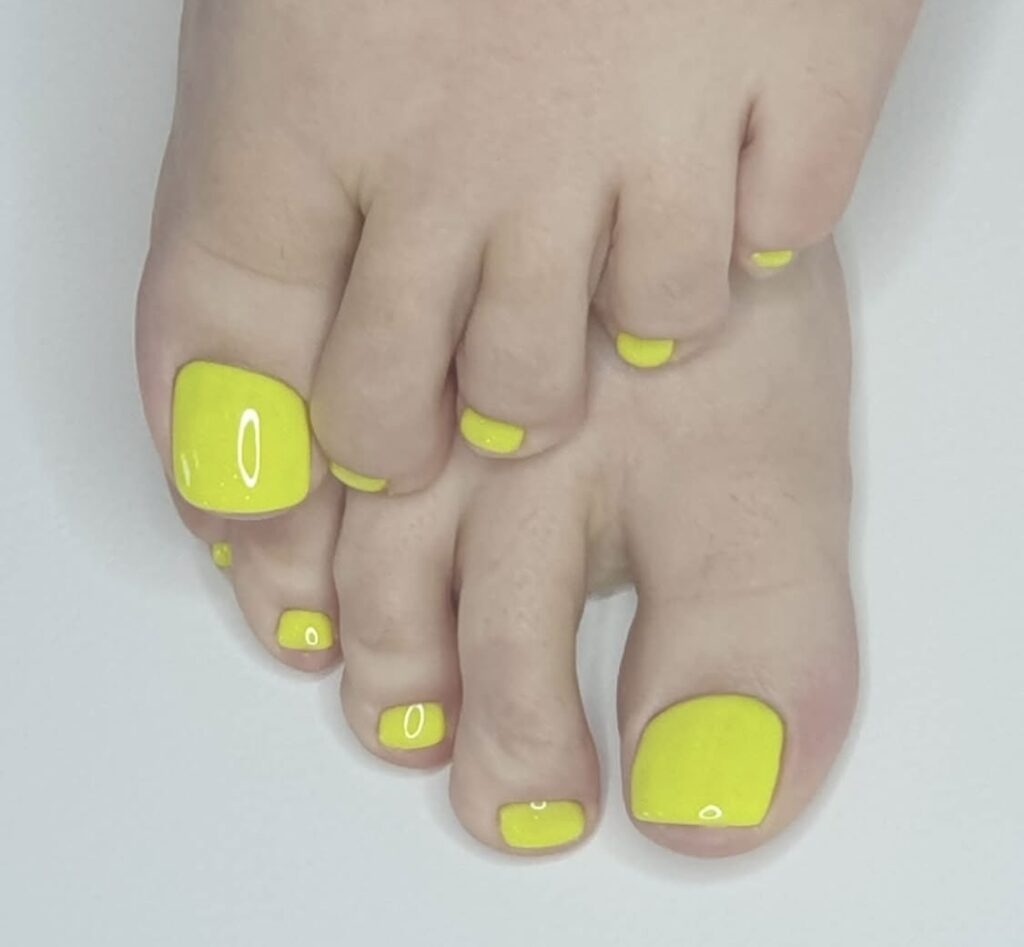 Polished pedicure by the nail team at Hairmess Salon in Boca Raton