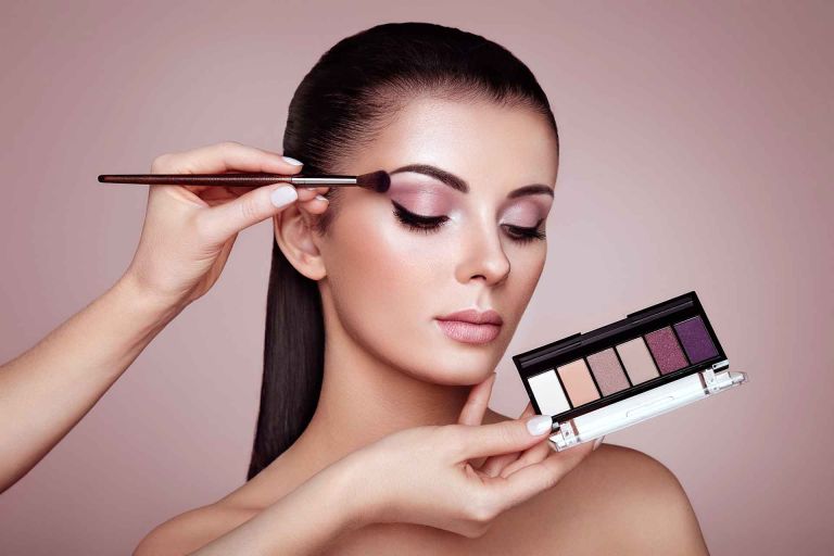 Makeup artist applying makeup – day, evening / glam and bridal makeup at Hairmess Salon