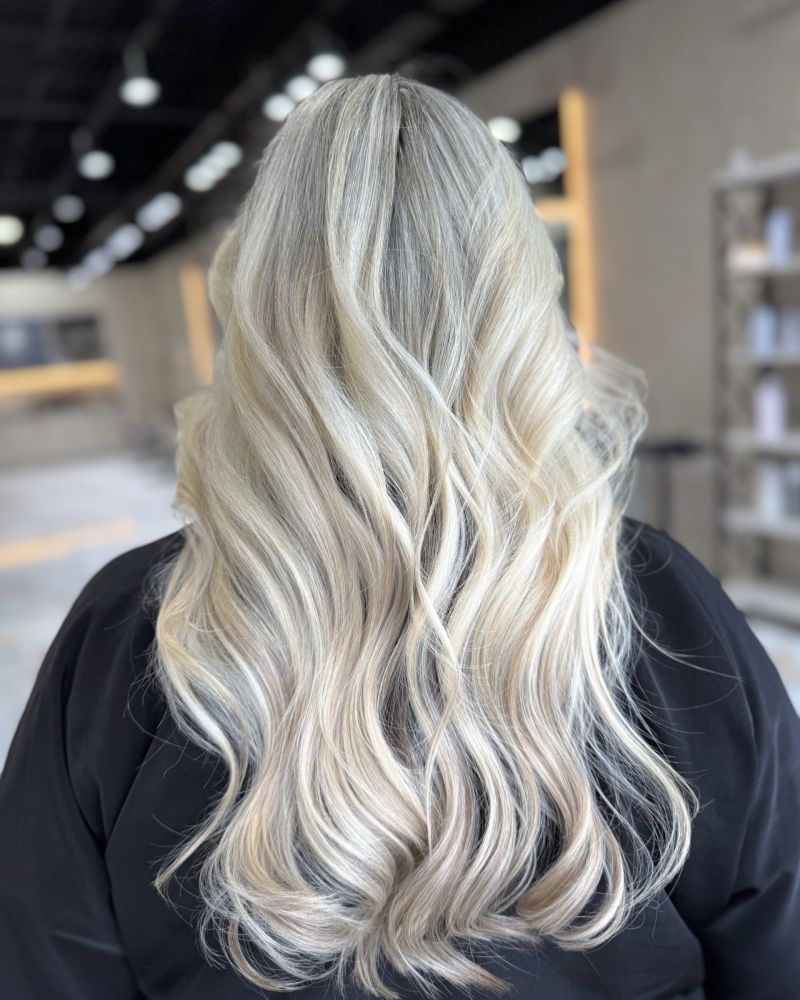 Icy blonde waves at Hairmess Salon