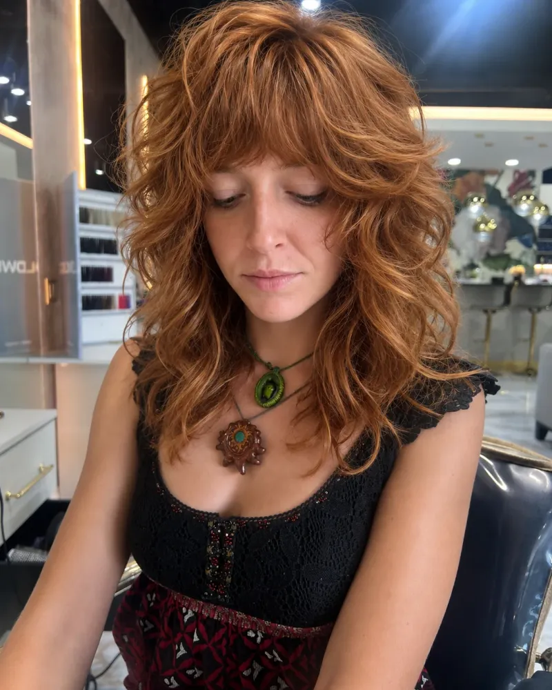 Copper curly shag haircut at Hairmess Salon