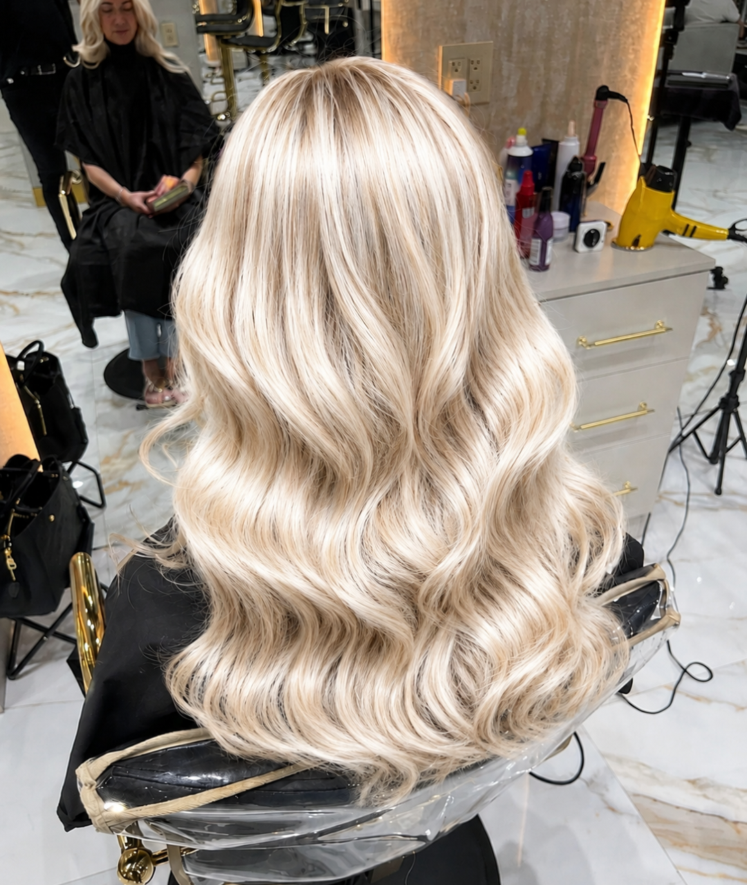 Bright, blended blonde waves at Hairmess Salon